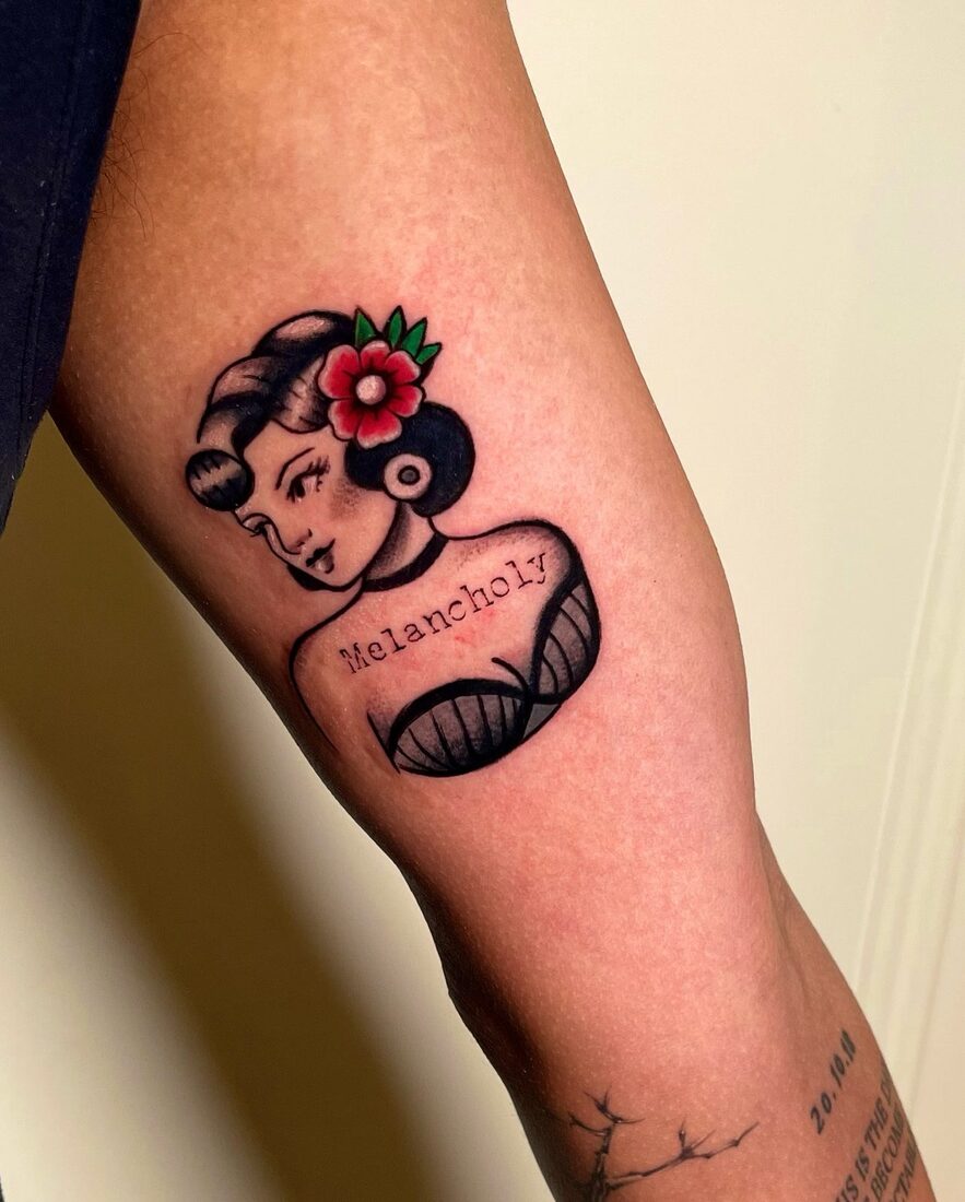 Neo-traditional pin-up tattoo by The Quinted