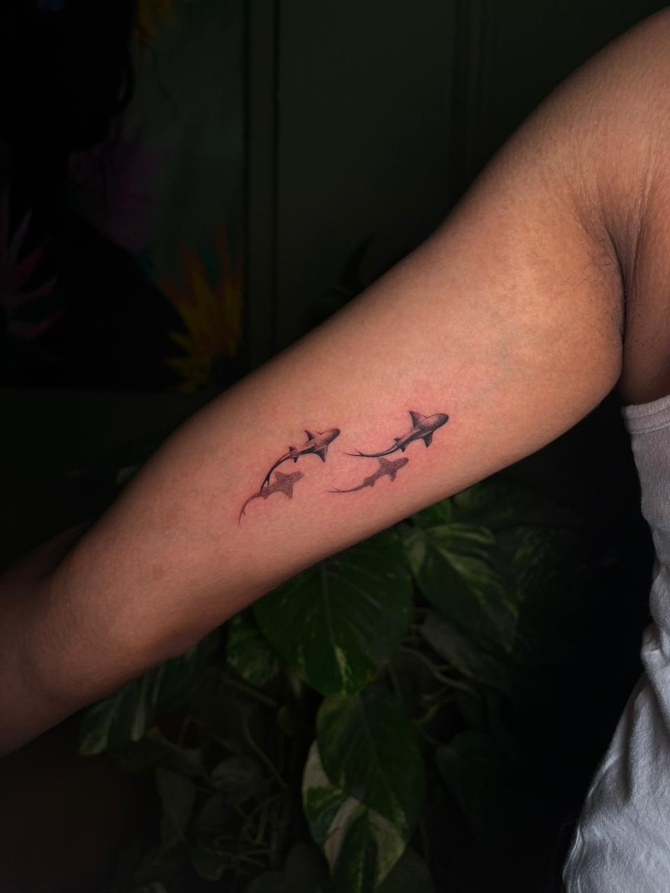 Micro realism shark and ray arm tattoo by The Quinted in New Delhi